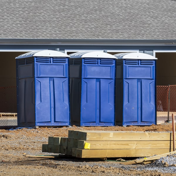 what is the cost difference between standard and deluxe porta potty rentals in Newfield Michigan